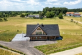 Exklusives Unternehmensanwesen mit Blockhaus, Microapartments, Gewerbehalle & Photovoltaik - Bild