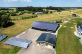 Exklusives Unternehmensanwesen mit Blockhaus, Microapartments, Gewerbehalle & Photovoltaik - Titelbild