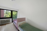 Großzügige 4,5-Zimmer-Wohnung mit ca. 117 m² Wohnfläche, sonnigem Balkon und Tiefgaragenstellplatz - Kinderzimmer 2